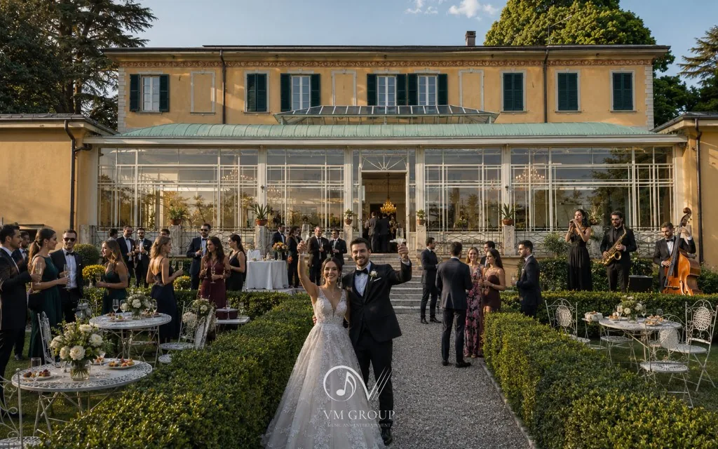 Aperitivo con musica live nel giardino di Villa Buttafava, sposi e ospiti tra buffet e artisti